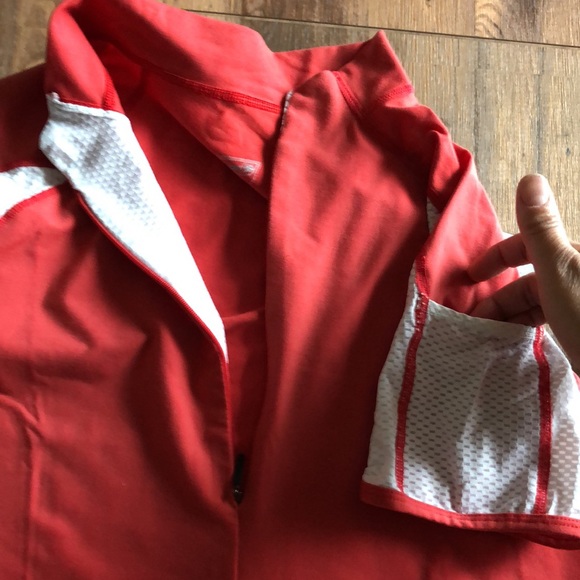 Sugoi, size medium, red, half zip, biking/running t-shirt. - Picture 8 of 10